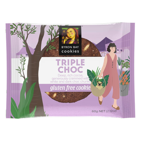 Picture of Byron Bay Cookies Triple Choc Gluten Free Cookie wrapped in purple flow wrap with picture of tree and woman holding basket filled with produce and pug dog.