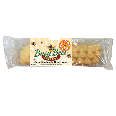 Busy Bees Baked Goods Canadian Maple Shortbread biscuits are shaped like christmas trees and delicately sprinkled with sugar.